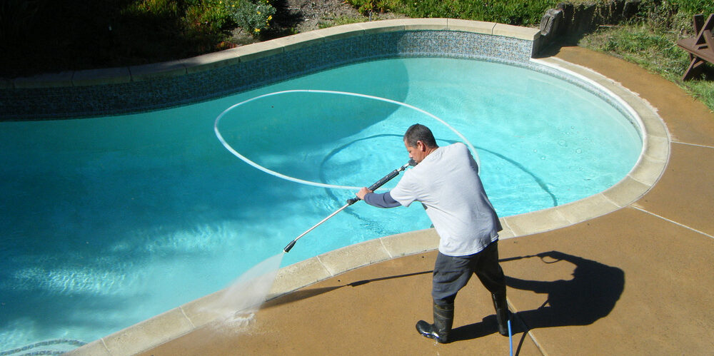 How Pressure Washing Can Keep Your Swimming Pool Clean 